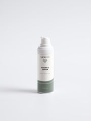 Front view of LUVBOD Vitamin C Serum bottle with green Horizon wave label.